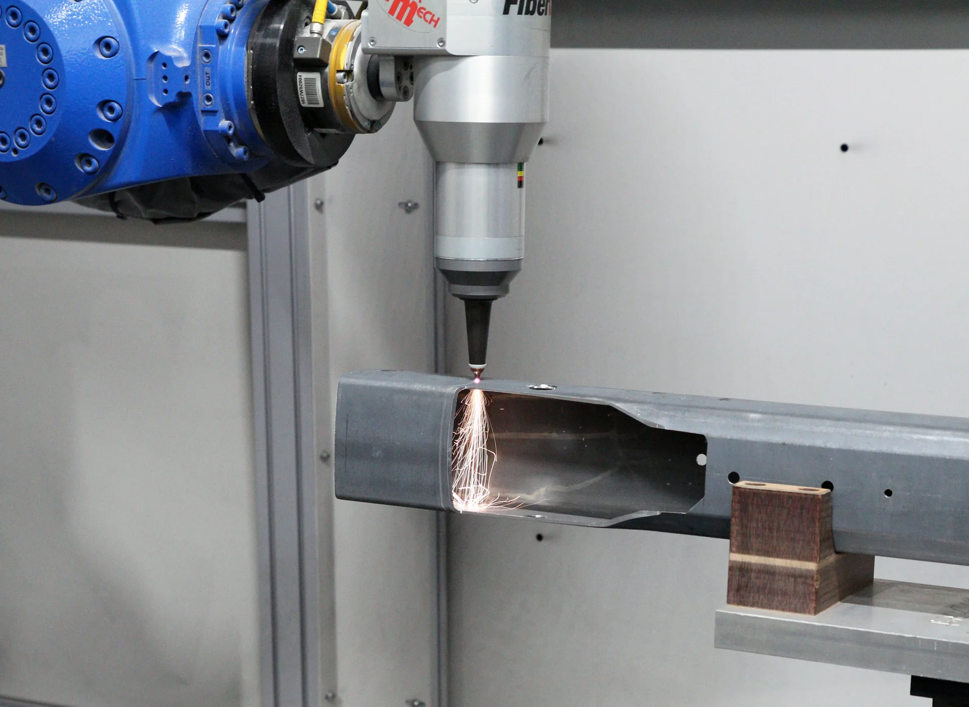 man wearing-gray-shirt-and-welding-mask-covered-in-welding-2760344